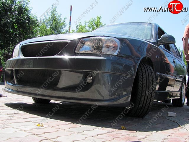 6 099 р. Передний бампер Racer Hyundai Accent 2 LC седан дорестайлинг (ТагАЗ) (1999-2012) (Неокрашенный)  с доставкой в г. Майкоп