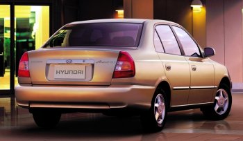 Задний бампер Стандартный Hyundai Accent 2 LC седан дорестайлинг (ТагАЗ) (1999-2012)
