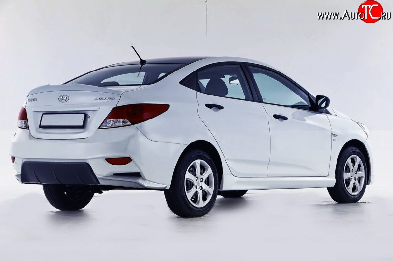 13 499 р. Задний бампер Sport Hyundai Solaris RBr седан дорестайлинг (2010-2014) (Неокрашенный)  с доставкой в г. Майкоп