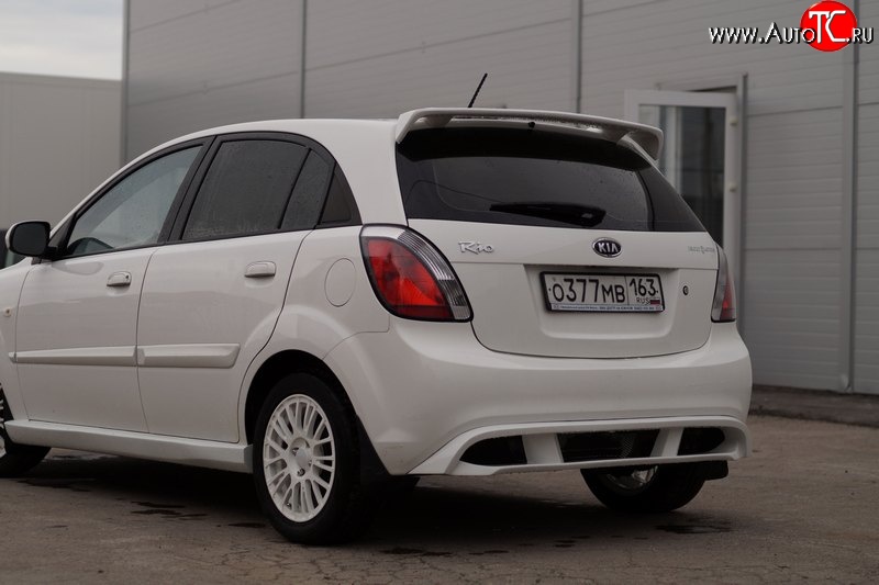 5 899 р. Накладка заднего бампера Vita Dm  KIA Rio ( 2 JB,  4 FB) (2005-2025) дорестайлинг, хэтчбэк 5 дв., рестайлинг, хэтчбэк 5 дв., рестайлинг седан (Неокрашенная)  с доставкой в г. Майкоп