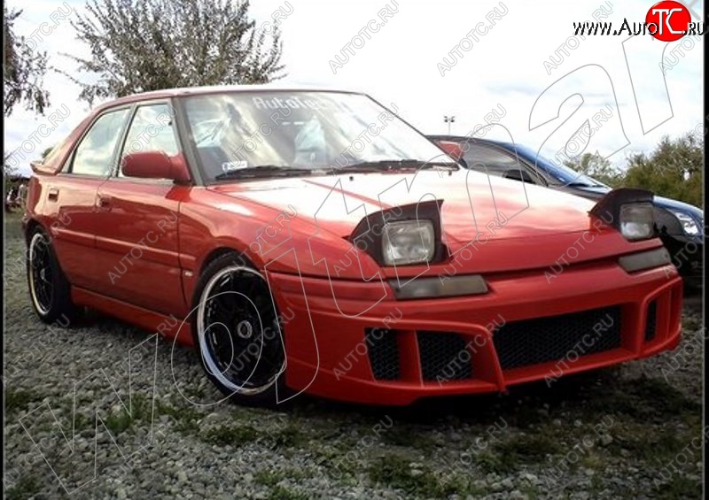 28 999 р. Передний бампер WK Mazda 323 BW рестайлинг седан (1989-1993)  с доставкой в г. Майкоп