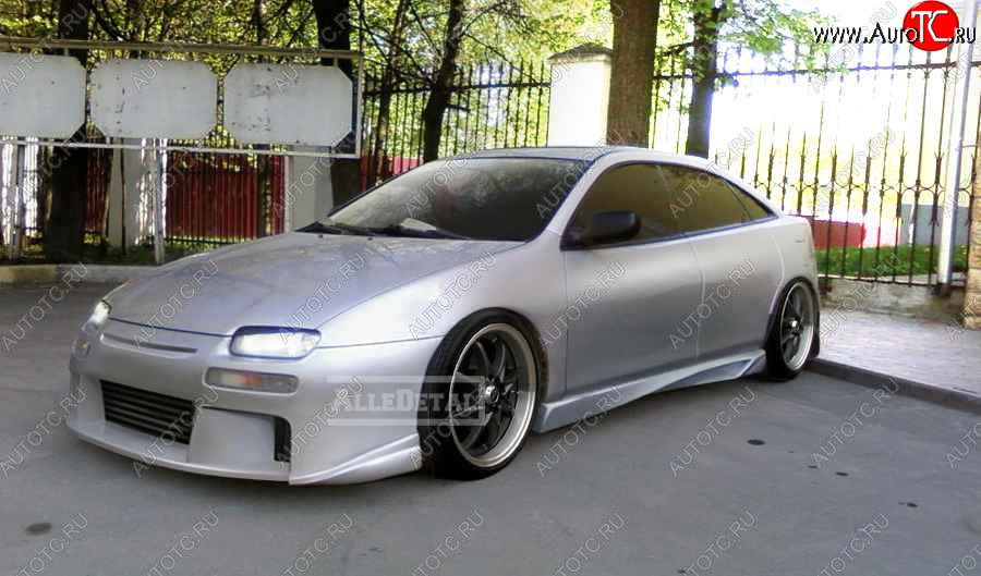 27 899 р. Передний бампер Next Mazda 323 BA дорестайлинг седан (1994-1996)  с доставкой в г. Майкоп
