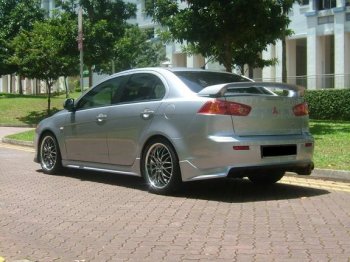 7 499 р. Накладка заднего бампера Zodiak (под одинарный выхлоп) MV-Tuning Mitsubishi Lancer 10 CY седан дорестайлинг (2007-2010) (Неокрашенная)  с доставкой в г. Майкоп. Увеличить фотографию 3
