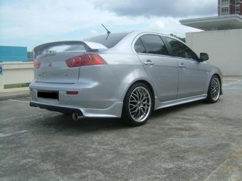 7 499 р. Накладка заднего бампера Zodiak (под одинарный выхлоп) MV-Tuning Mitsubishi Lancer 10 CY седан дорестайлинг (2007-2010) (Неокрашенная)  с доставкой в г. Майкоп. Увеличить фотографию 4
