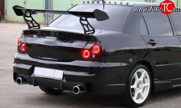 18 499 р. Задний бампер INGS Extreem  Mitsubishi Lancer  9 CS (2003-2009) седан 1-ый рестайлинг, седан 2-ой рестайлинг (Неокрашенный)  с доставкой в г. Майкоп