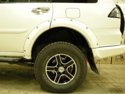 15 349 р. Накладки на колёсные арки BUSHWACKER Mitsubishi Pajero Sport PB дорестайлинг (2008-2013) (Неокрашенные)  с доставкой в г. Майкоп. Увеличить фотографию 3