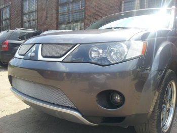 3 299 р. Защитная сетка в бампер (низ, ячейка 3х7 мм) Alfeco Стандарт Mitsubishi Outlander XL (CW)  дорестайлинг (2005-2009) (Хром)  с доставкой в г. Майкоп. Увеличить фотографию 3
