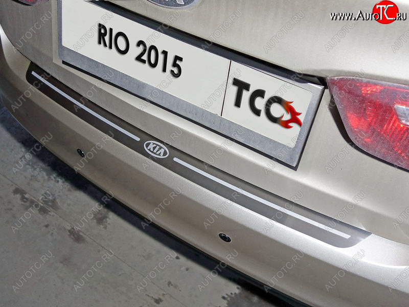 2 999 р. Накладка на задний бампер, ТСС Тюнинг  KIA Rio  3 QB (2015-2017) рестайлинг седан, рестайлингхэтчбек5дв. (лист шлифованный надпись RIO)  с доставкой в г. Майкоп