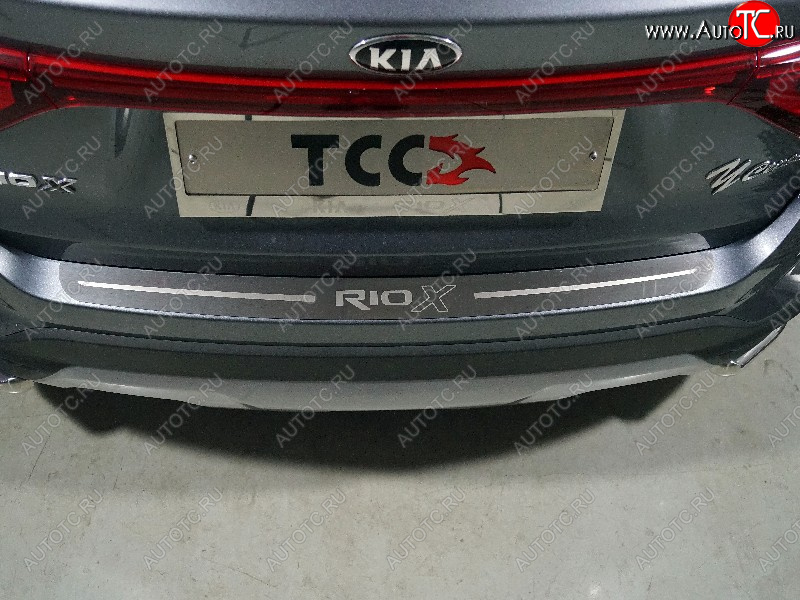 2 689 р. Накладка на задний бампе, ТСС Тюнинг  KIA Rio  X (2020-2025) рестайлинг (лист шлифованный надпись RIO X)  с доставкой в г. Майкоп