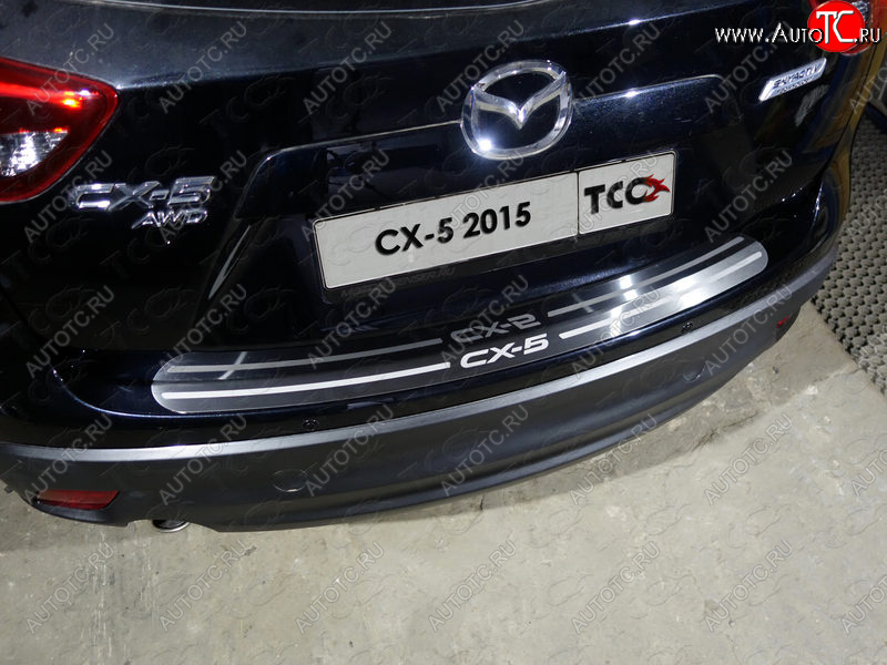 3 999 р. Накладка на задний бампер, ТСС Тюнинг  Mazda CX-5  KE (2015-2017) рестайлинг (лист шлифованный надпись CX-5)  с доставкой в г. Майкоп