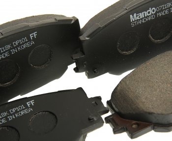 2 489 р. Колодки тормозные передние (4шт.) MANDO Toyota Auris E150 хэтчбэк 5 дв. дорестайлинг (2006-2010)  с доставкой в г. Майкоп. Увеличить фотографию 2