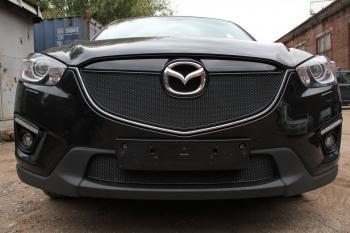 799 р. Зимняя заглушка решетки радиатора (с парктроником) PREMIUM Стрелка11 Mazda CX-5 KE дорестайлинг (2011-2014) (черная)  с доставкой в г. Майкоп. Увеличить фотографию 2