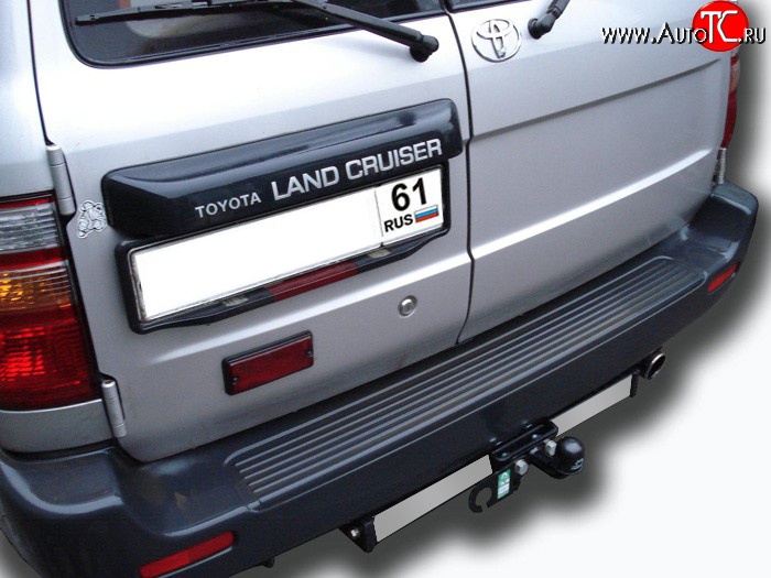 10 099 р. Фаркоп Лидер Плюс (с нержавеющей пластиной). Toyota Land Cruiser J105 (1998-2007) (Без электропакета)  с доставкой в г. Майкоп