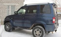 7 399 р. Рейлинги Ралекс-Тюнинг  Уаз Патриот  Спорт (2012-2013) (Нагрузка до 100 кг (усиленные кронштейны башмаков 4 штуки) (2 башмака))  с доставкой в г. Майкоп. Увеличить фотографию 2