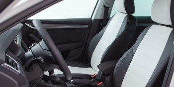 6 999 р. Чехлы Seintex (экокожа, 40/60, Airbag)  Лада Веста ( 2180,  SW 2181) - Веста Кросс ( 2181,  2180) (черный/белый)  с доставкой в г. Майкоп. Увеличить фотографию 2