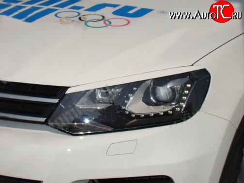 1 149 р. Реснички на фары Sport Volkswagen Touareg NF (2010-2014) дорестайлинг (Неокрашенные) с доставкой в г. Майкоп Увеличить фотографию 1 1 149 р. Реснички на фары Sport Volkswagen Touareg NF (2010-2014) дорестайлинг (Неокрашенные) с доставкой в г. Майкоп